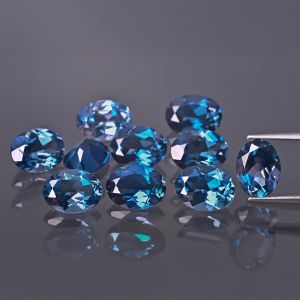 Pietra ovale, cono - Topazio London Blue 7x5 MM